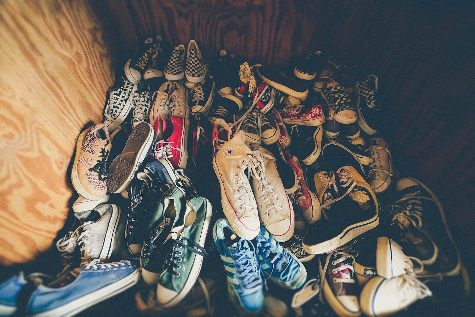 Liquidation inventory of assorted shoes packed on a box at discount prices
