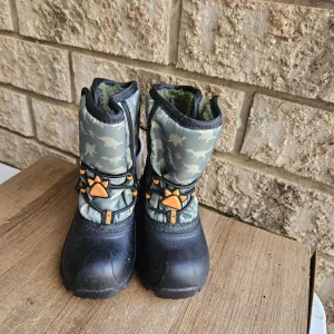 Grey dinosaur print toddler snow boots with orange paw-print toggles